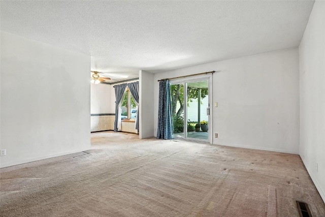 4121 Lexington Dr NE Unit B, Cedar Rapids, IA 52402 - spare room with carpet flooring and a textured ceiling