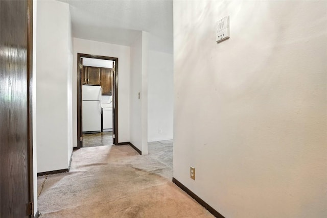 4121 Lexington Dr NE Unit B, Cedar Rapids, IA 52402 - hall with carpet and baseboards