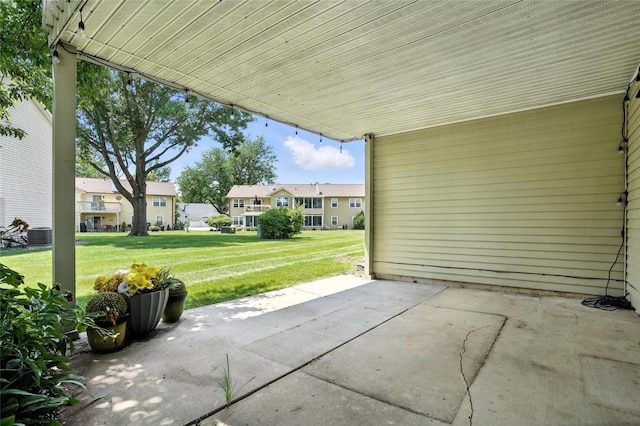 4121 Lexington Dr NE Unit B, Cedar Rapids, IA 52402 - view of patio featuring a residential view