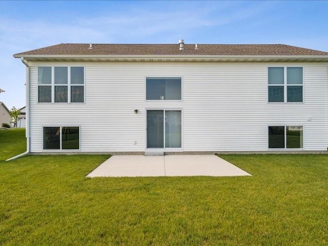 1326 Echo Ridge Ln, Marion, IA 52302 - back of house featuring a yard, a patio area, and roof with shingles