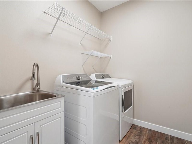 1326 Echo Ridge Ln, Marion, IA 52302 - washroom with washer and dryer and dark wood-type flooring