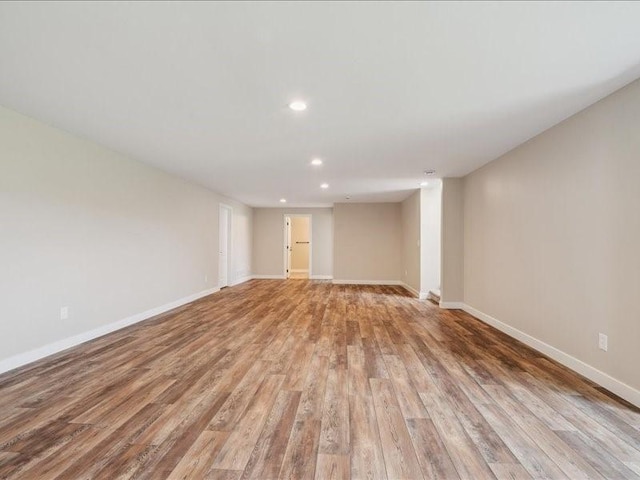 1326 Echo Ridge Ln, Marion, IA 52302 - unfurnished living room with light wood finished floors and recessed lighting