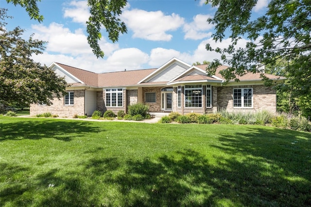 4452 Plumberry Rd, Ely, IA 52227 - single story home with a front lawn and brick siding