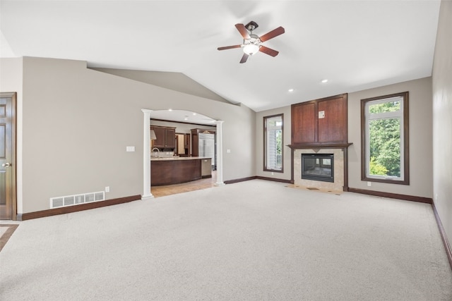 4452 Plumberry Rd, Ely, IA 52227 - unfurnished living room with a fireplace, a ceiling fan, light colored carpet, lofted ceiling, and recessed lighting