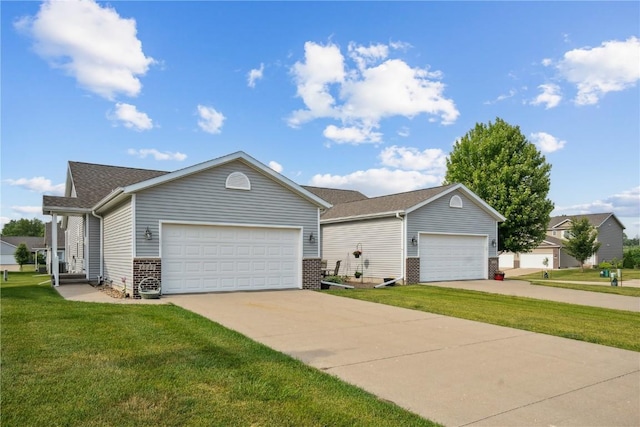 1727 Hunters Creek Way, Marion, IA 52302 - view of front of property with a front lawn, brick siding, concrete driveway, and a shingled roof