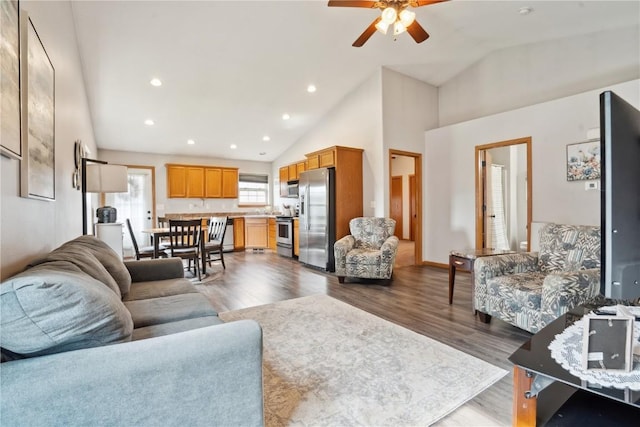 1727 Hunters Creek Way, Marion, IA 52302 - living room featuring ceiling fan, high vaulted ceiling, wood finished floors, and recessed lighting