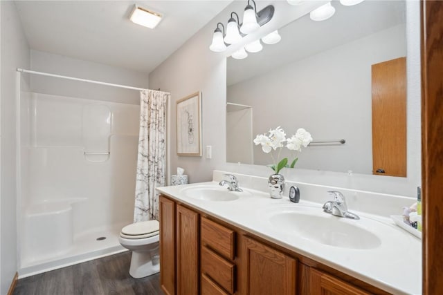 1727 Hunters Creek Way, Marion, IA 52302 - full bathroom featuring wood finished floors, double vanity, and a shower with shower curtain