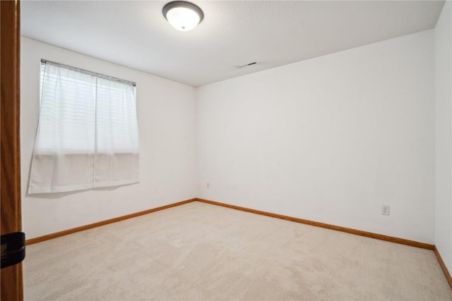 1727 Hunters Creek Way, Marion, IA 52302 - spare room featuring carpet flooring