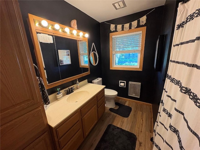 21 Mill St, Walker, IA 52352 - full bathroom with vanity, wood finished floors, and a shower with curtain
