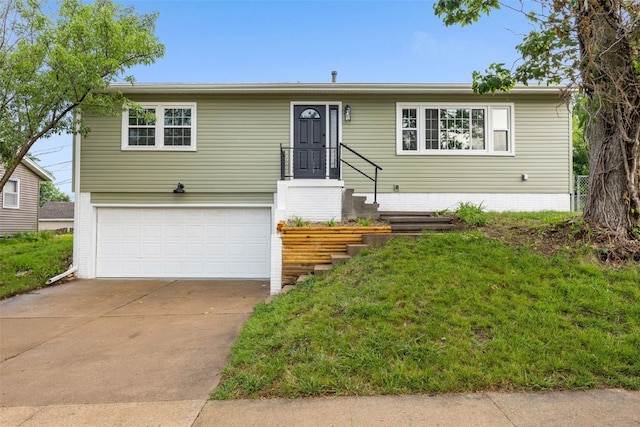 1642 19th St, Cedar Rapids, IA 52405 - view of front of home with an attached garage and driveway
