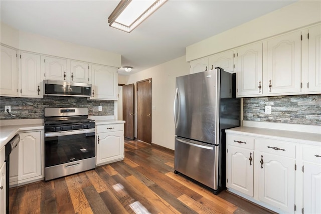 6752 29th Ave, Shellsburg, IA 52332 - kitchen featuring stainless steel appliances, tasteful backsplash, light countertops, and white cabinetry