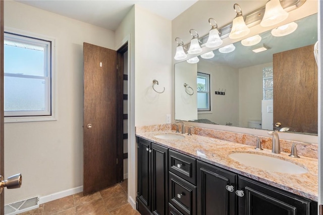 6752 29th Ave, Shellsburg, IA 52332 - bathroom featuring double vanity and tile patterned flooring