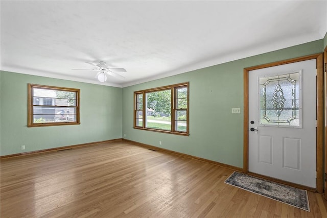 340 18th St NW, Cedar Rapids, IA 52405 - entryway featuring plenty of natural light, light wood-style flooring, and ceiling fan