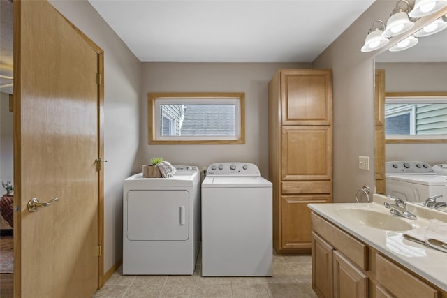 340 18th St NW, Cedar Rapids, IA 52405 - laundry room with washing machine and clothes dryer and light tile patterned floors