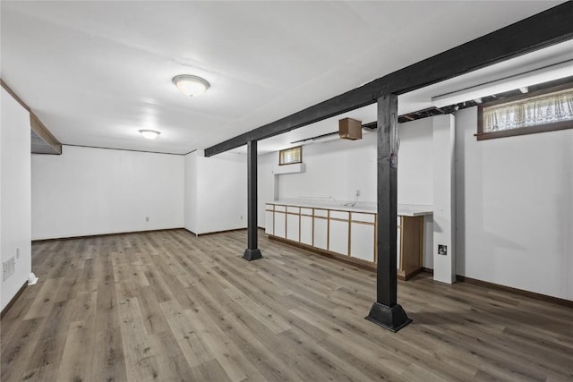 340 18th St NW, Cedar Rapids, IA 52405 - below grade area featuring wood finished floors