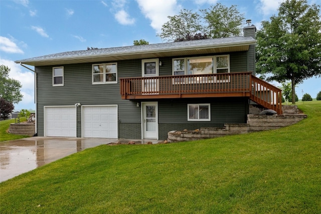 7812 Wieneke Cir, Cedar Rapids, IA 52404 - view of front of home with a chimney, a front lawn, driveway, and an attached garage