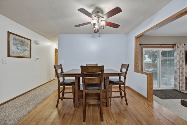 7812 Wieneke Cir, Cedar Rapids, IA 52404 - dining space featuring light wood-style floors, ceiling fan, and light colored carpet
