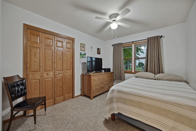 7812 Wieneke Cir, Cedar Rapids, IA 52404 - carpeted bedroom featuring a ceiling fan and a closet