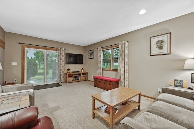 7812 Wieneke Cir, Cedar Rapids, IA 52404 - living room with light colored carpet and recessed lighting