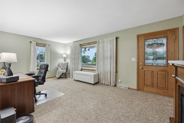 7812 Wieneke Cir, Cedar Rapids, IA 52404 - home office with healthy amount of natural light and carpet