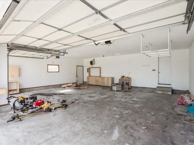 3182 62nd St, Shellsburg, IA 52332 - garage featuring a garage door opener