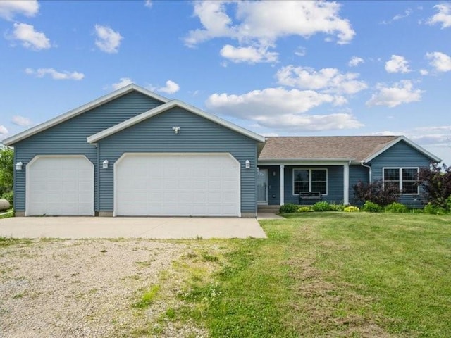 3182 62nd St, Shellsburg, IA 52332 - ranch-style home with an attached garage, a front lawn, and driveway