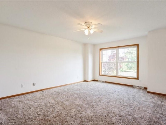 3182 62nd St, Shellsburg, IA 52332 - unfurnished room with carpet and ceiling fan