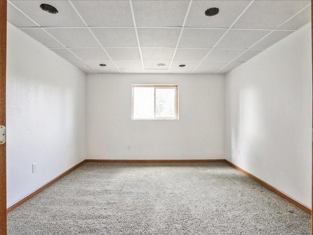 3182 62nd St, Shellsburg, IA 52332 - carpeted empty room with a drop ceiling and baseboards
