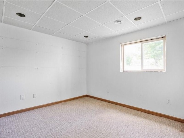 3182 62nd St, Shellsburg, IA 52332 - spare room featuring a paneled ceiling and light carpet