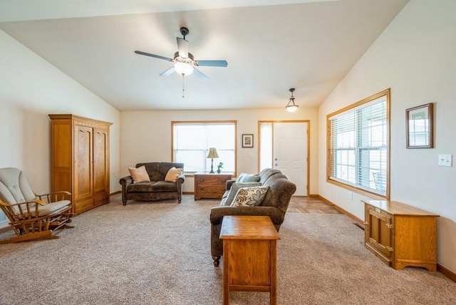 919 Deer Run Dr NE, Cedar Rapids, IA 52402 - living room with vaulted ceiling, light carpet, a ceiling fan, and plenty of natural light