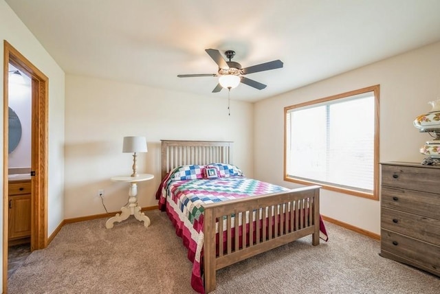 919 Deer Run Dr NE, Cedar Rapids, IA 52402 - carpeted bedroom featuring baseboards and ceiling fan