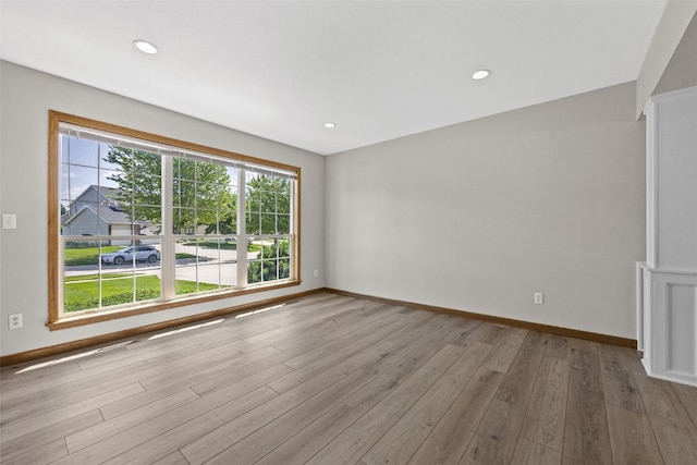 7603 Hampshire Dr NE, Cedar Rapids, IA 52402 - spare room featuring wood finished floors and recessed lighting