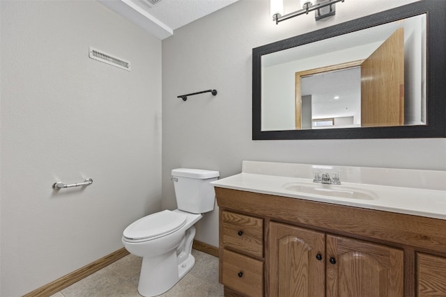 7603 Hampshire Dr NE, Cedar Rapids, IA 52402 - half bathroom with vanity and tile patterned flooring