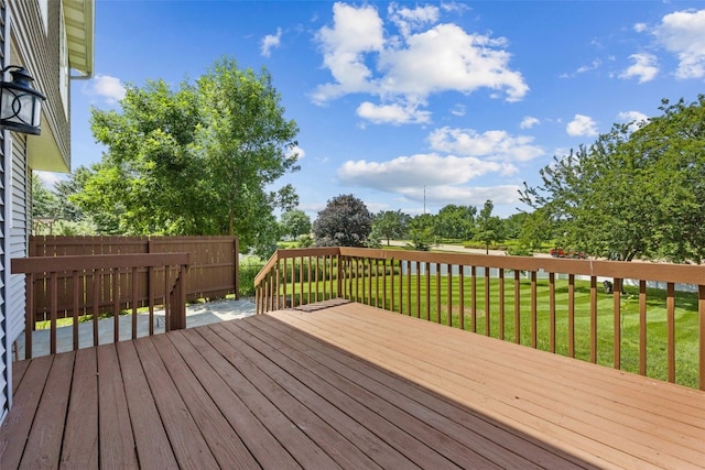 7603 Hampshire Dr NE, Cedar Rapids, IA 52402 - wooden deck featuring a yard
