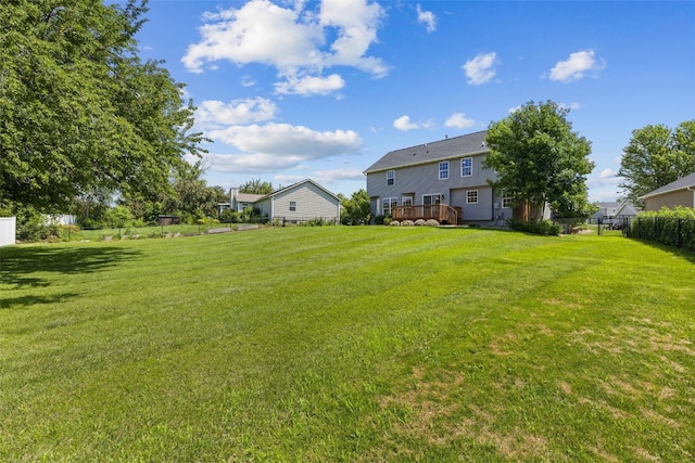 7603 Hampshire Dr NE, Cedar Rapids, IA 52402 - view of yard featuring a wooden deck