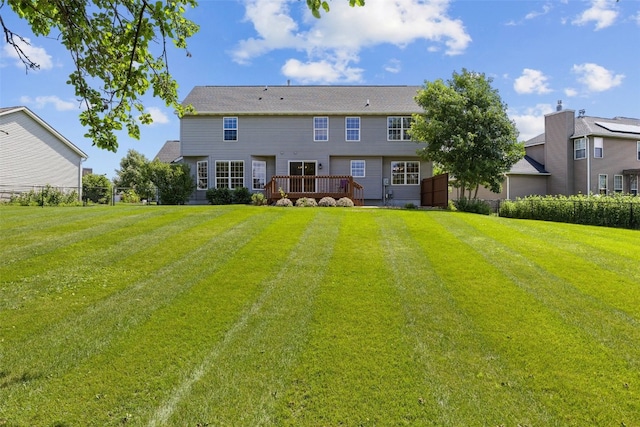 7603 Hampshire Dr NE, Cedar Rapids, IA 52402 - back of property with a deck