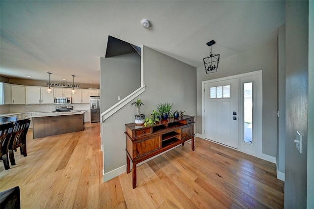 509 Grey Slate Dr SW, Cedar Rapids, IA 52404 - entrance foyer featuring light wood-style flooring and recessed lighting