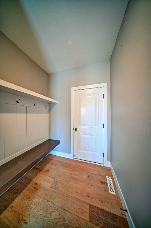 509 Grey Slate Dr SW, Cedar Rapids, IA 52404 - mudroom with wood finished floors and baseboards