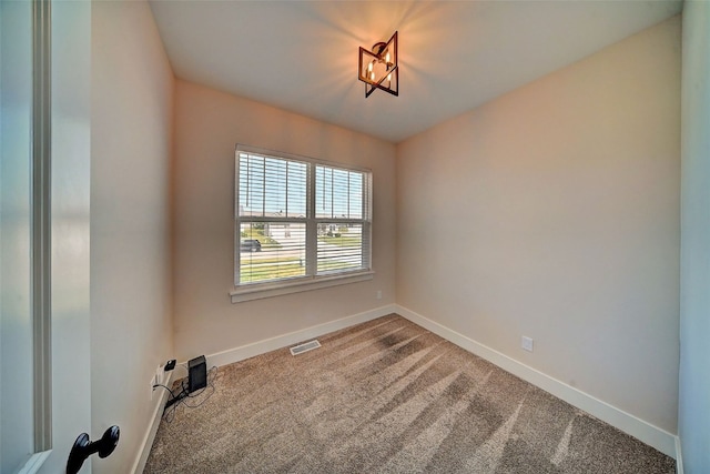 509 Grey Slate Dr SW, Cedar Rapids, IA 52404 - unfurnished room featuring carpet and baseboards