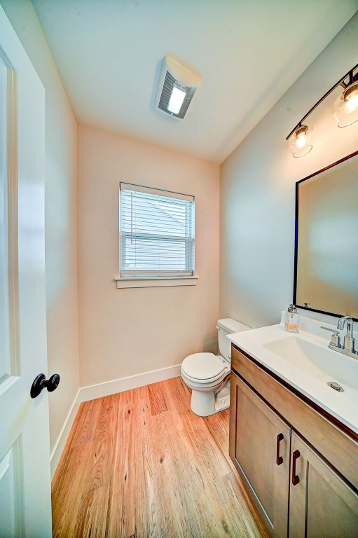 509 Grey Slate Dr SW, Cedar Rapids, IA 52404 - bathroom featuring wood finished floors and vanity