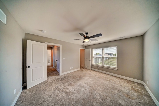509 Grey Slate Dr SW, Cedar Rapids, IA 52404 - unfurnished bedroom with carpet and ceiling fan