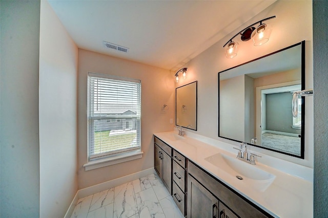 509 Grey Slate Dr SW, Cedar Rapids, IA 52404 - full bath featuring double vanity and marble finish floors
