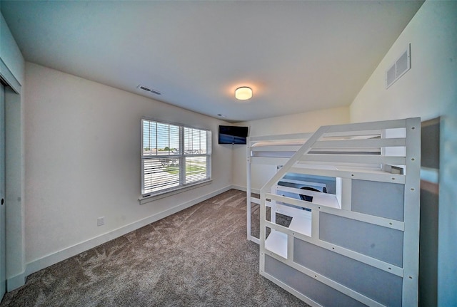 509 Grey Slate Dr SW, Cedar Rapids, IA 52404 - unfurnished bedroom with carpet flooring and baseboards