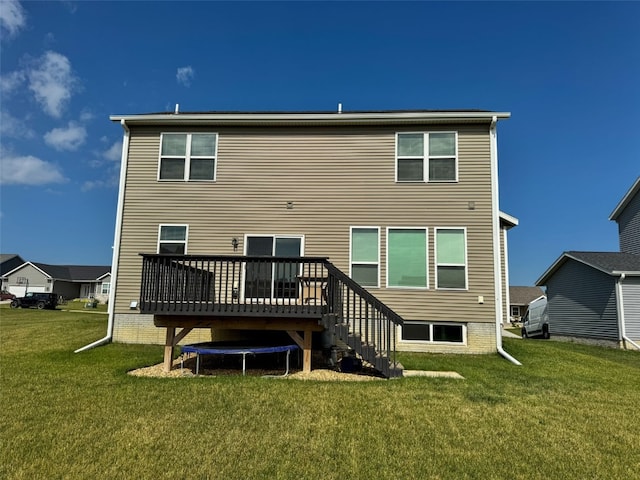 509 Grey Slate Dr SW, Cedar Rapids, IA 52404 - rear view of property featuring a wooden deck and a lawn