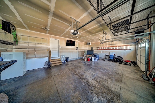 509 Grey Slate Dr SW, Cedar Rapids, IA 52404 - garage featuring a garage door opener