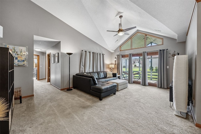 4725 Westchester Dr NE Unit C, Cedar Rapids, IA 52402 - living area featuring carpet flooring, high vaulted ceiling, ceiling fan, and a textured ceiling