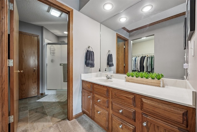 4725 Westchester Dr NE Unit C, Cedar Rapids, IA 52402 - full bathroom featuring a shower stall, vanity, and a spacious closet