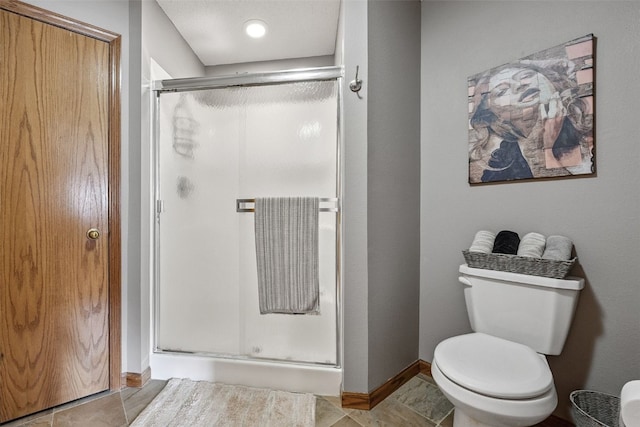 4725 Westchester Dr NE Unit C, Cedar Rapids, IA 52402 - bathroom with a stall shower and toilet