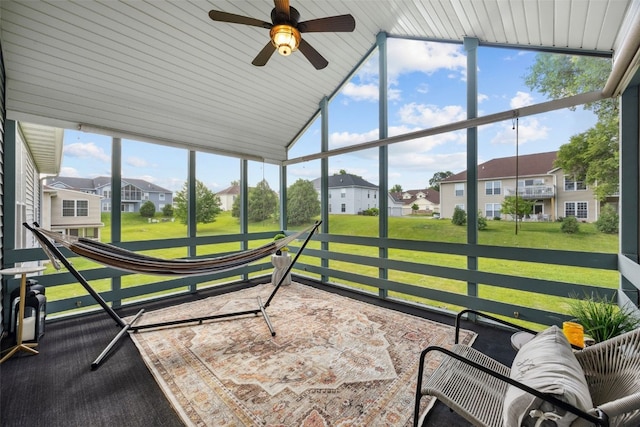 4725 Westchester Dr NE Unit C, Cedar Rapids, IA 52402 - sunroom featuring a residential view, a ceiling fan, and vaulted ceiling