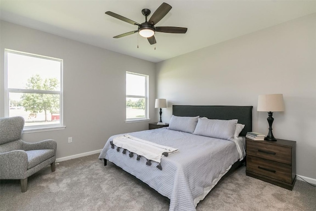 806 Crestview Dr, Solon, IA 52333 - bedroom featuring light carpet and a ceiling fan